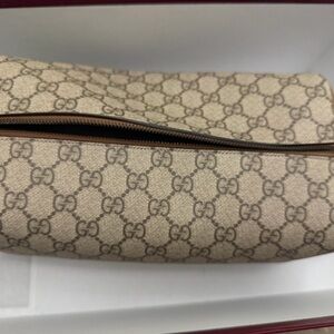 Gucci Tan Monogram Clutch
